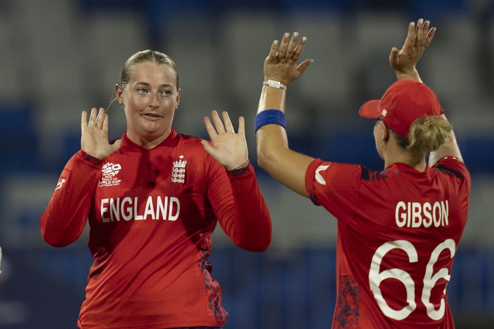 Sophie Ecclestone, left, took two for 15 from four overs (Altaf Qadri/AP)