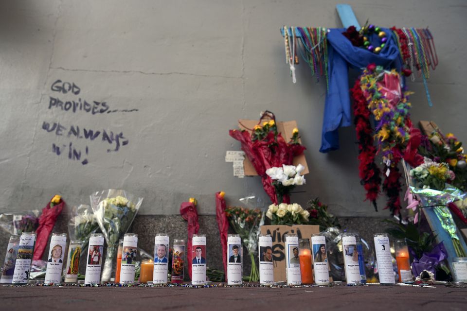 A memorial for the victims of a deadly New Year’s Day truck attack in the French Quarter of New Orleans (George Walker IV/AP)