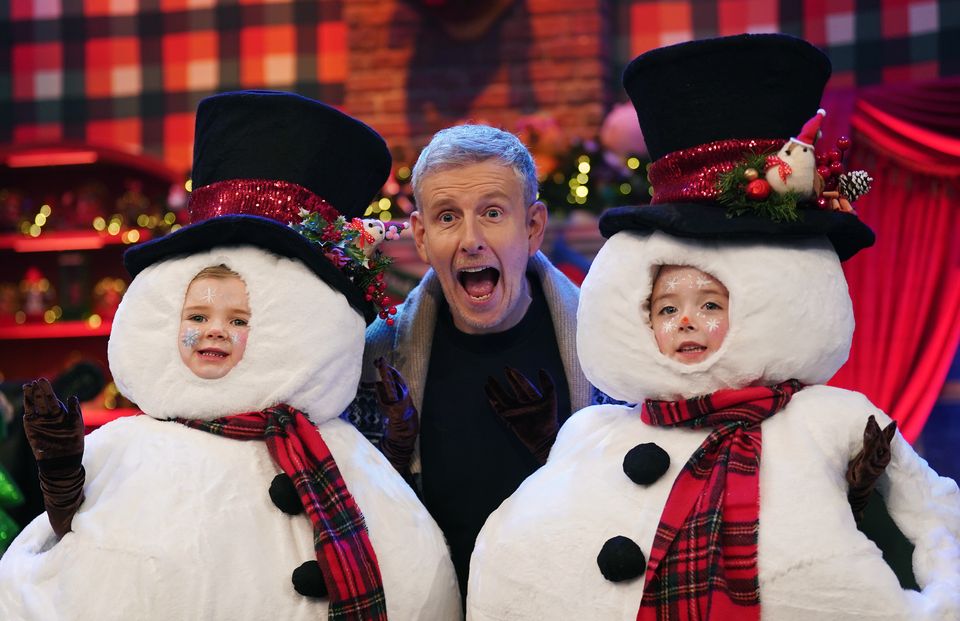 Patrick Kielty with Tara Dowling and Cuinn O’Dowd at the unveiling of the theme and set for The Late Late Toy Show (Brian Lawless/PA)