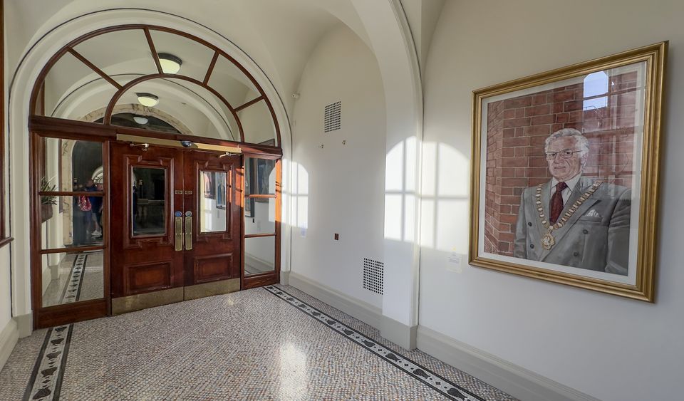 The empty space on the wall outside The Banqueting Hall of Belfast City Hall, where the portrait of DUP lord mayor Lord Wallace Browne once hung (Liam McBurney/PA)