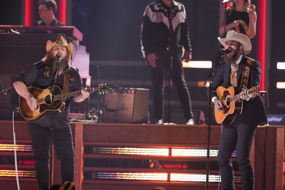 Chris Stapleton and Post Malone perform together (George Walker IV/AP)