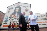 thumbnail: Loyalist Jackie McDonald (left) and artist Ross Wilson at the launch of a new mural in Sandy Row that has replaced a notorious depiction of a UFF gunman