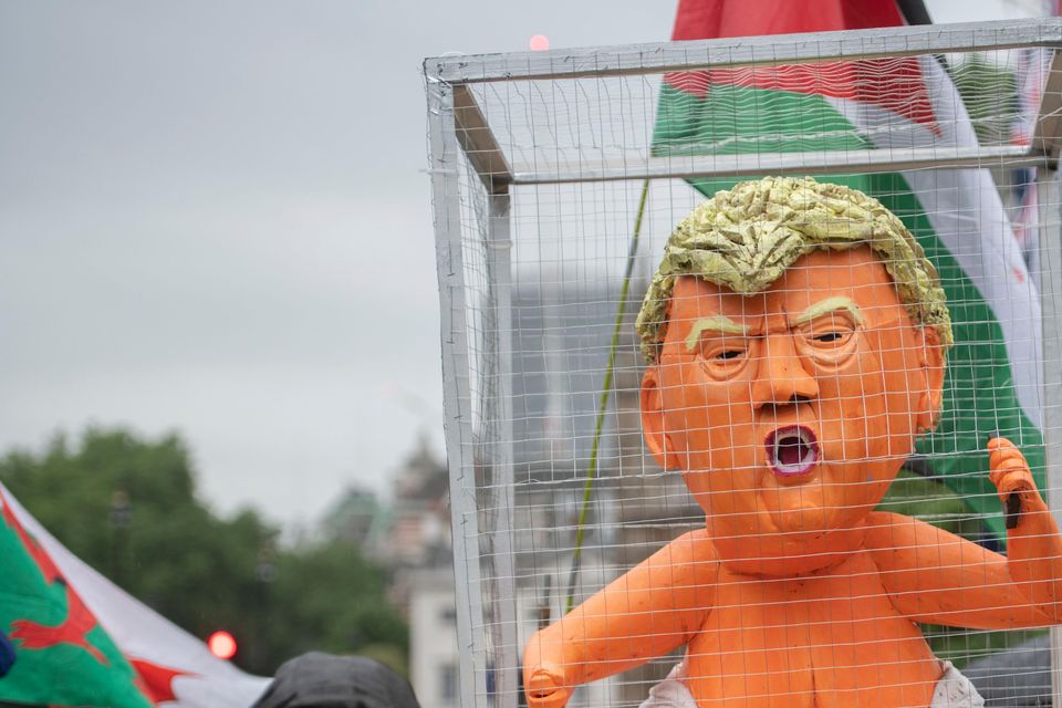 Protesters in Parliament Square on the second day of the state visit to the UK by then US president Donald Trump (David Mirzoeff/PA)