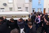 thumbnail: Hundreds of people gathered in Lurgan, Northern Ireland,  for the funeral Violet Crumlish, fondly described by family members as the 'Traveller Queen'