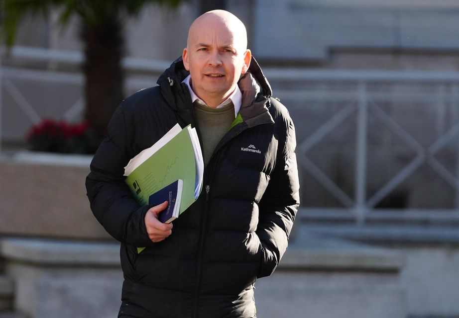 Paul Murphy holding a copy of the Constitution of Ireland (Brian Lawless/PA)