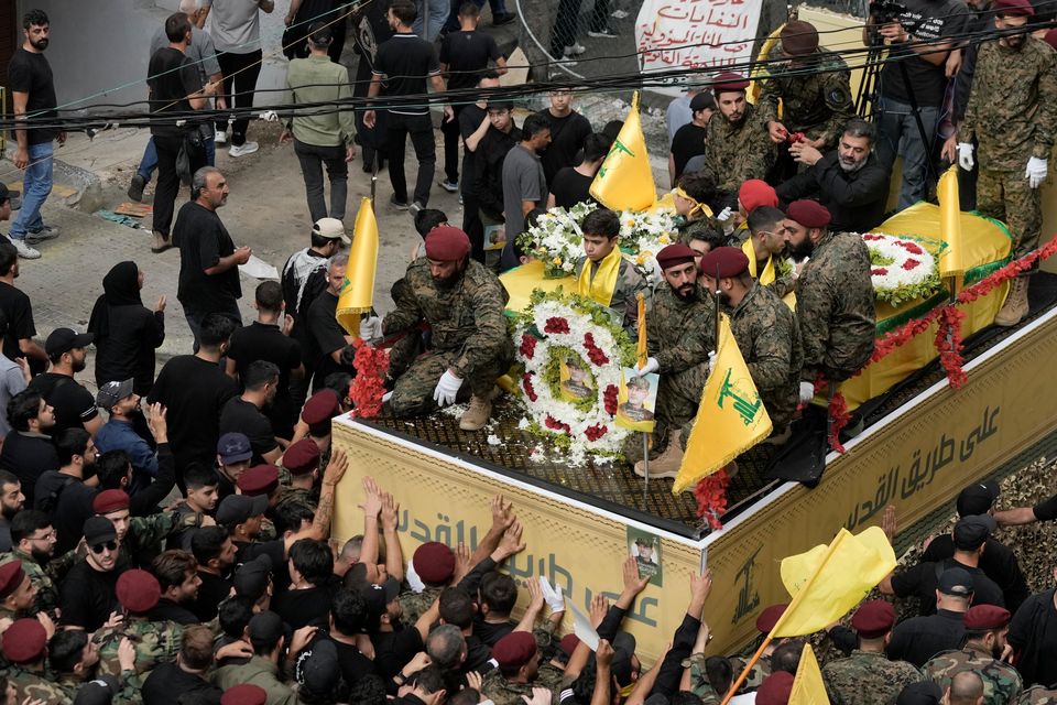 Senior Hezbollah commanders died during the strikes on Friday (AP)