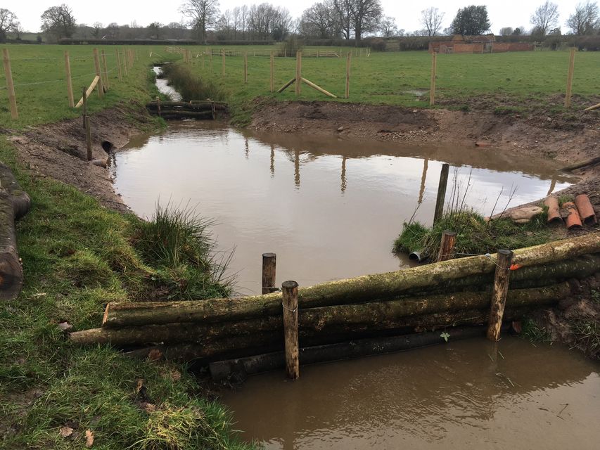 A new retention pool was created at a Warwickshire farm as part of natural flood measures (Nick Martin/PA)