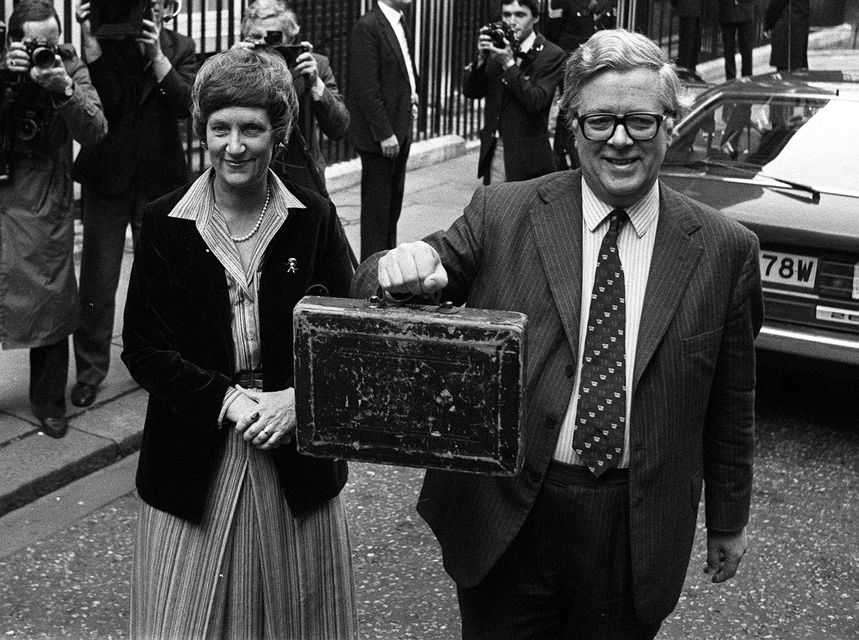 Then-chancellor of the exchequer Geoffrey Howe with his wife Elspeth in Downing Street as he made his way to the Commons to deliver his budget speech (PA)