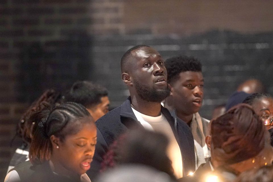 Stormzy (centre) joined a vigil in Croydon (Yui Mok/PA)