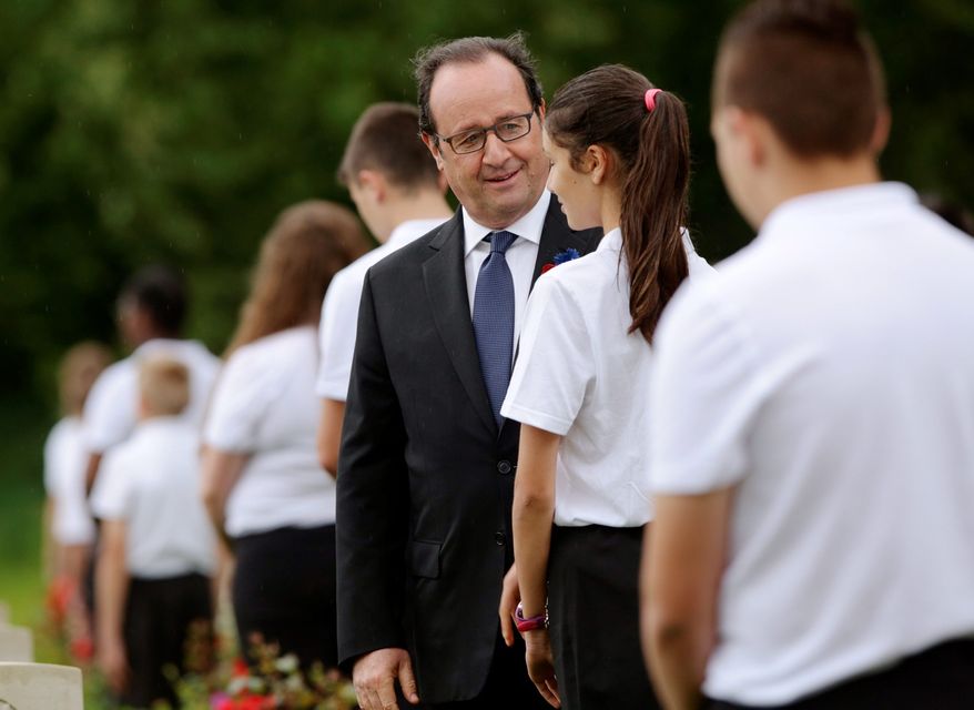 THIEPVAL, FRANCE - JULY 1: French President Francois Hollande meets British and French school children during the Commemoration of the Centenary of the Battle of the Somme at the Commonwealth War Graves Commission Thiepval Memoria on July 1, 2016 in Thiepval, France. The event is part of the Commemoration of the Centenary of the Battle of the Somme at the Commonwealth War Graves Commission Thiepval Memorial in Thiepval, France, where 70,000 British and Commonwealth soldiers with no known grave are commemorated. (Photo bt Yui Mok - Pool/Getty Images)