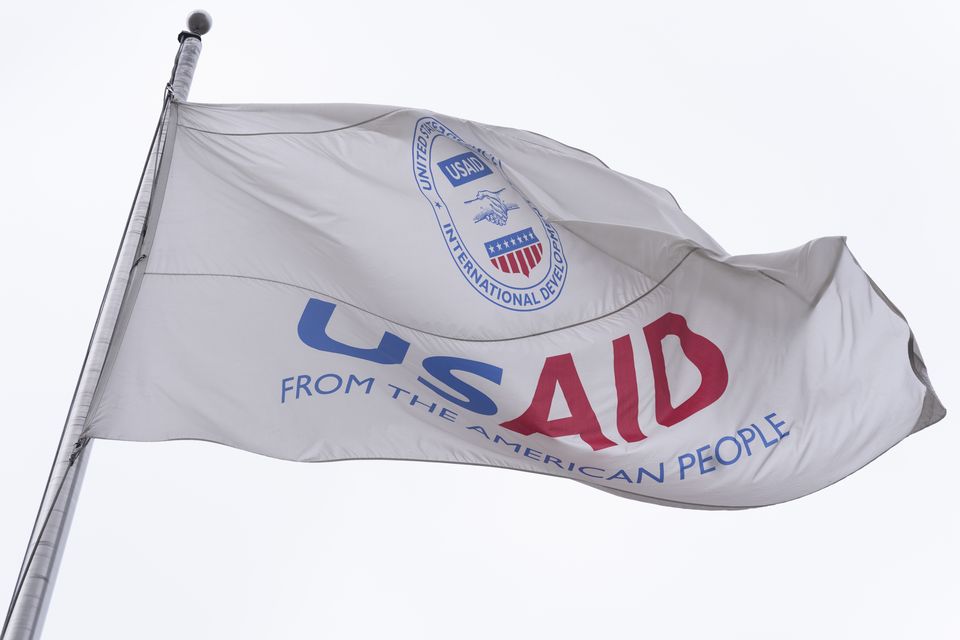 The flag of the United States Agency for International Development, or USAID, flies in front of the USAID office (Manuel Balce Ceneta/AP)