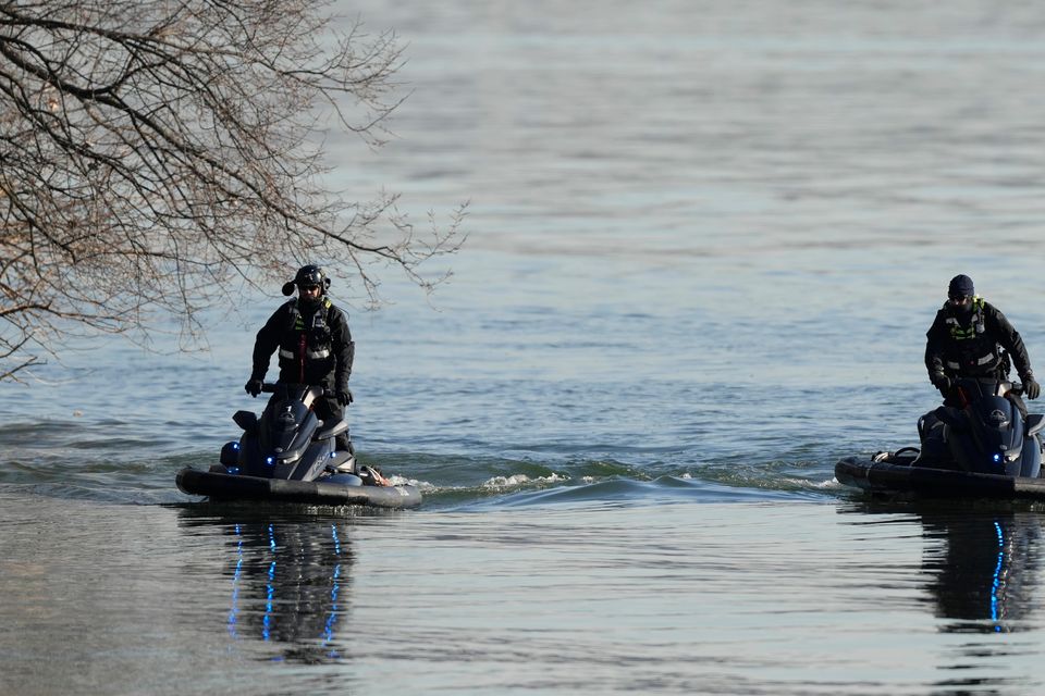 Search and rescue efforts are seen around a wreckage site in the Potomac River (Carolyn Kaster/AP)