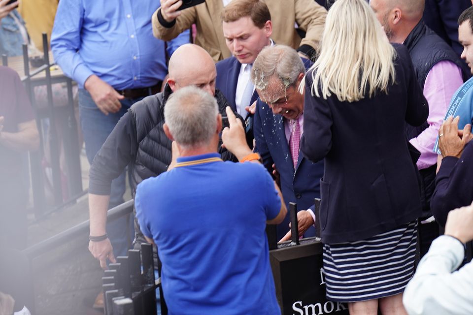 Nigel Farage had a drink thrown over him after launching his general election campaign in Clacton (James Manning/PA)