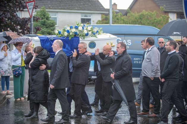 Football club emblem on coffin of Derry teenager after Donegal crash