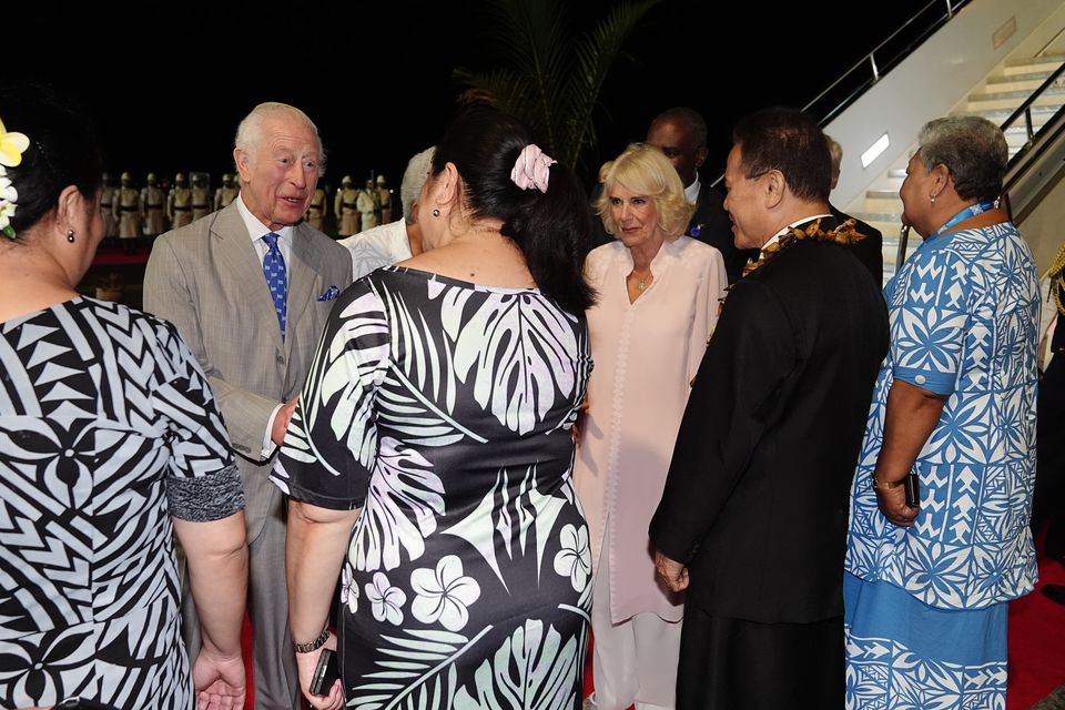 Charles and Camilla are welcomed to Samoa as they arrive at Faleolo International Airport (Aaron Chown/PA)