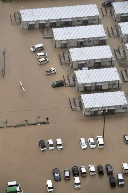 A number of houses have been flooded in Wajima (Kyodo News via AP)