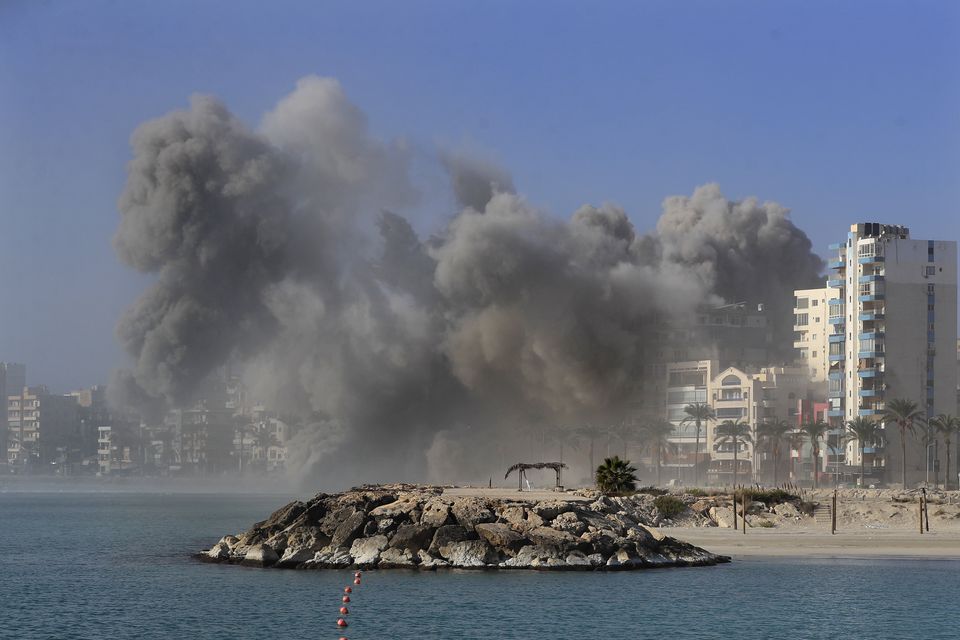 Smoke rises from buildings hit in Israeli airstrikes in Tyre, southern Lebanon (Mohammad Zaatari/AP)