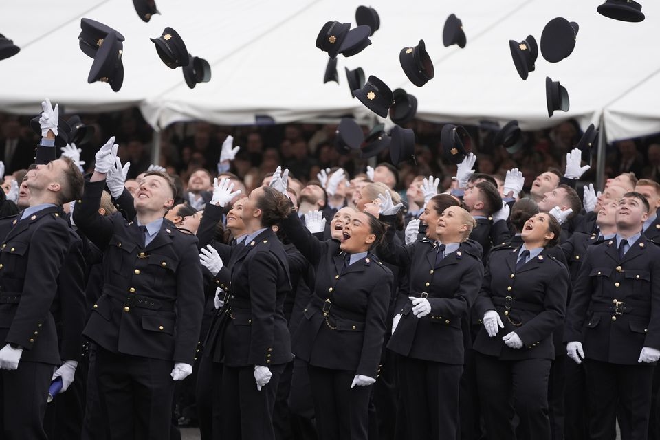 Garda graduates celebrate at the Garda College graduation ceremony at McCan Barracks in Templemore, Co Tipperary, on December 12 (Brian Lawless/PA)