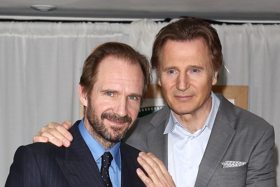 Ralph Fiennes has defended Liam Neeson