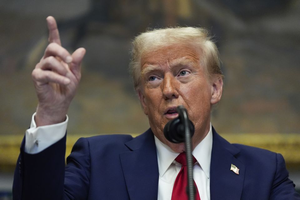 President Donald Trump speaks in the Roosevelt Room of the White House on Wednesday (Julia Demaree Nikhinson/AP)