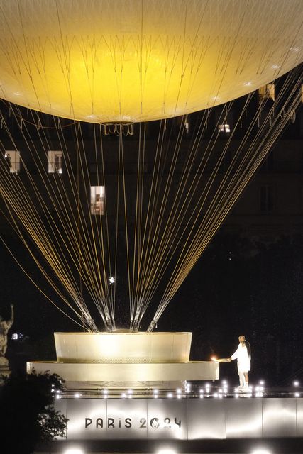 The Olympic flame in a hot air balloon (Miguel Tona/PA)