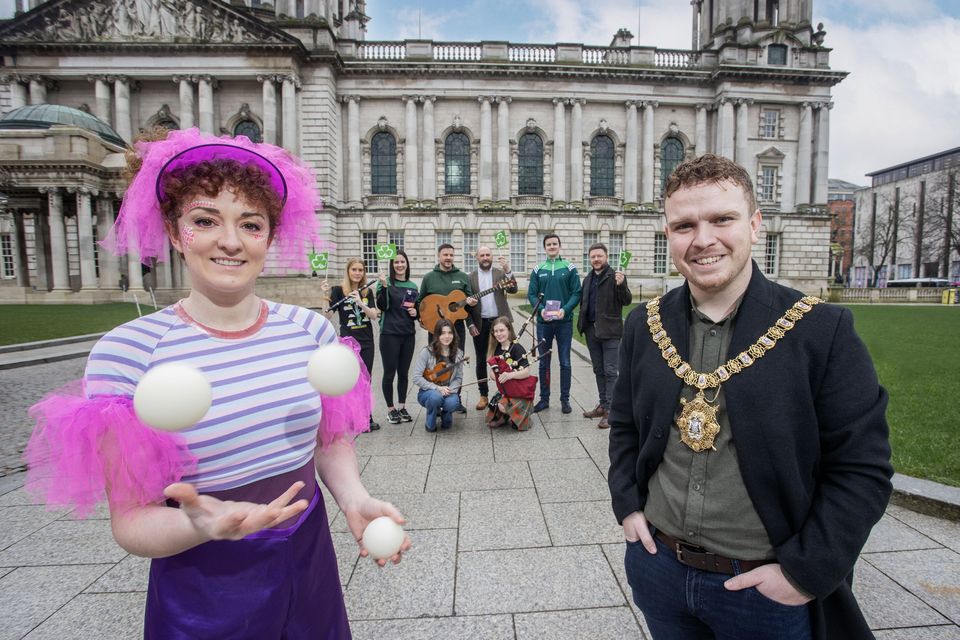 Lord Mayor of Belfast, Councillor Ryan Murphy, and circus performer Louise Glendinning join local musicians and representatives from Belfast Tradfest, Conradh na Gaeilge and Féile an Phobail to launch Belfast’s St Patrick’s Day programme