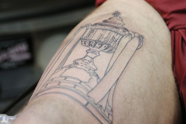 Former Northern Ireland star Colin O'Neill gets inked to mark finest hour  in the club game 