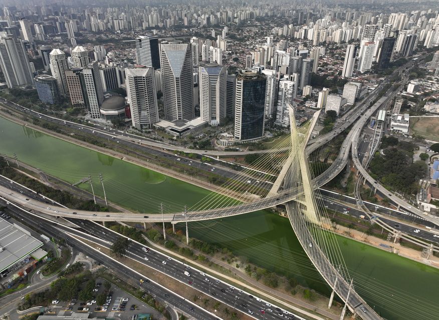 The river has turned green (Andre Penner/AP)