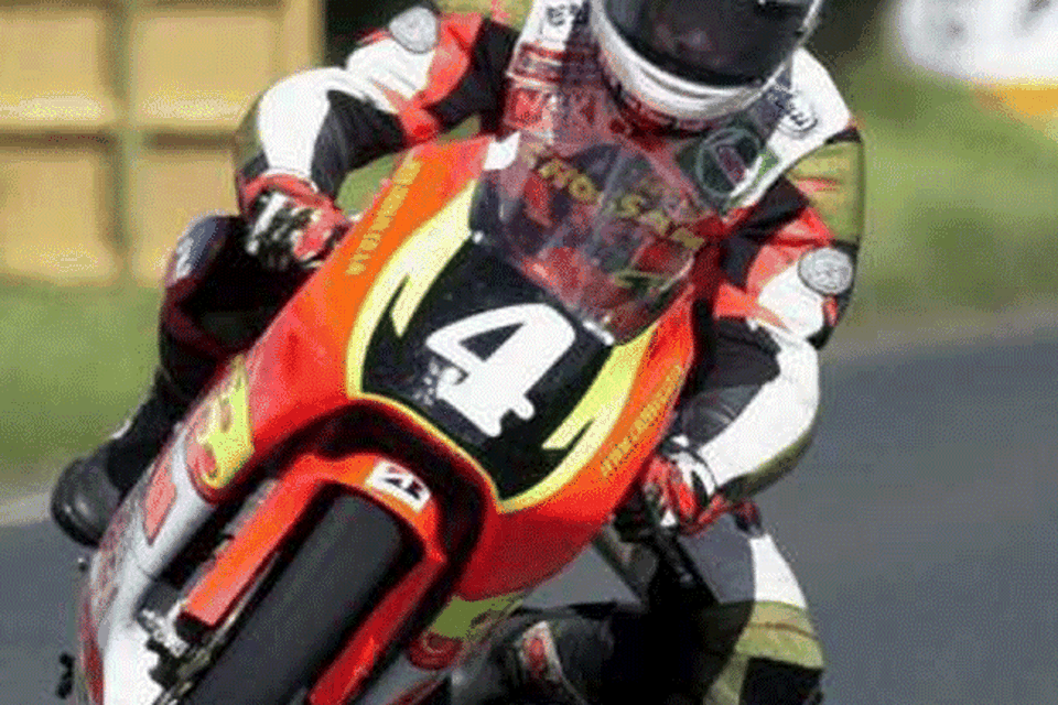 Robert Dunlop on his way to an emotional victory in the 125cc class at the Ulster Grand Prix.