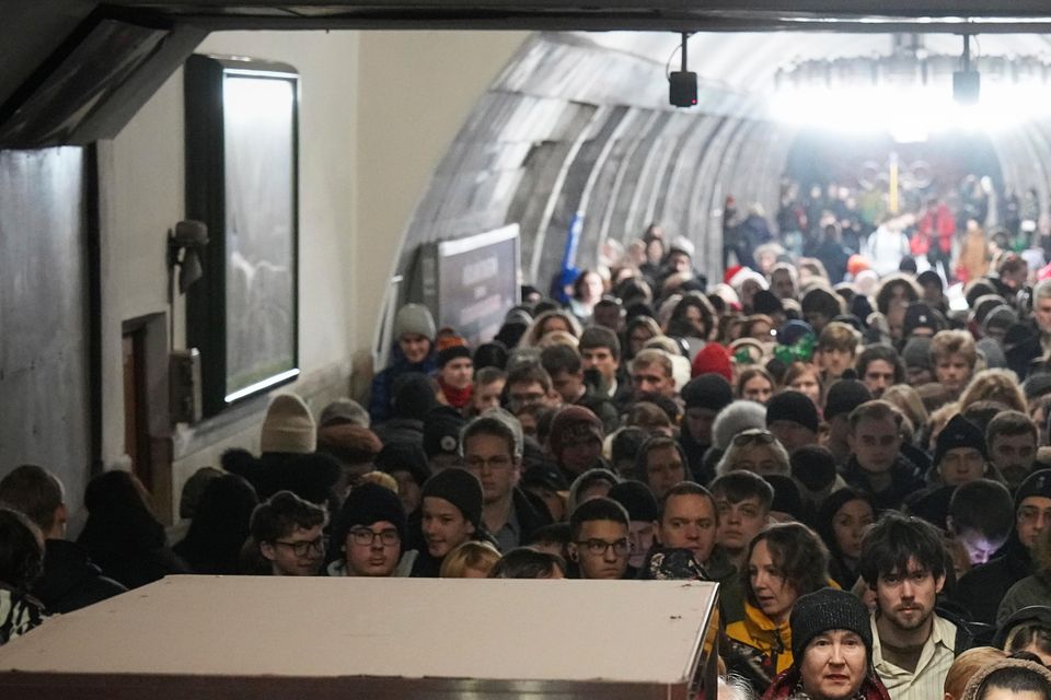 People take shelter in a metro station during an air raid alarm in Kyiv on Friday (Efrem Lukatsky/AP)