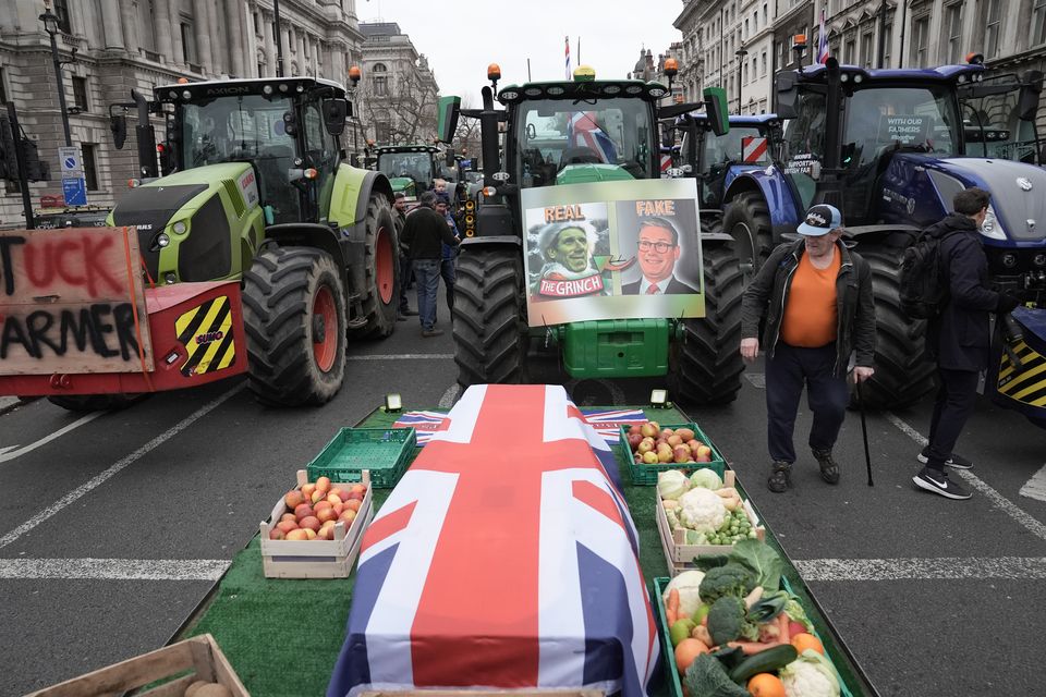 A coffin draped in the Union flag, symbolising the death of British farming, formed part of the protest (Stefan Rousseau/PA)