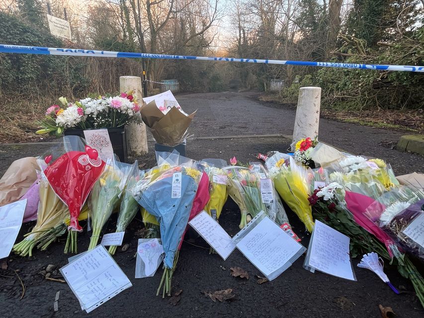 Flowers left near the scene (Matthew Cooper/PA)