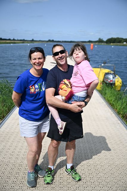 Eve Williams (right) with her father Steve and mother Jenni (Superhero Tri powered by Marvel/Andy Hooper/PA)