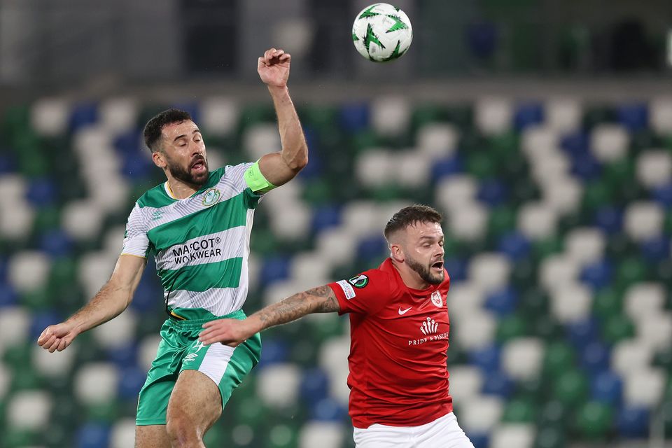 Shamrock Rovers’ Roberto Lopes (left) and Larne’s Andy Ryan battle for the ball during the Uefa Europa Conference League group stage match at Windsor Park in Belfast (Liam McBurney/PA)