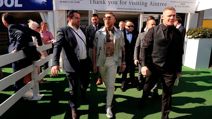 Conor McGregor stuns racegoers with spectacular entrance to Aintree Grand  National