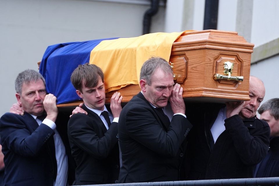 The coffin of Michael O’Sullivan is carried into St John the Baptist Church, Glantane (Brian Lawless/PA)