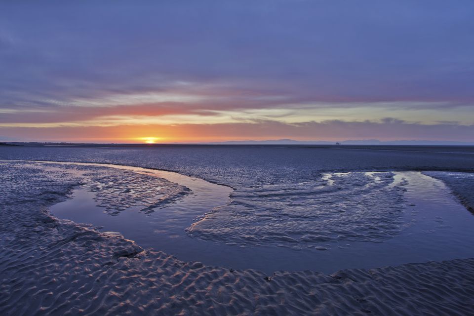 Mudflats at dawn in the Solway Firth, Dumfries and Galloway, Scotland (Mark Hamblin/2020Vision/PA)