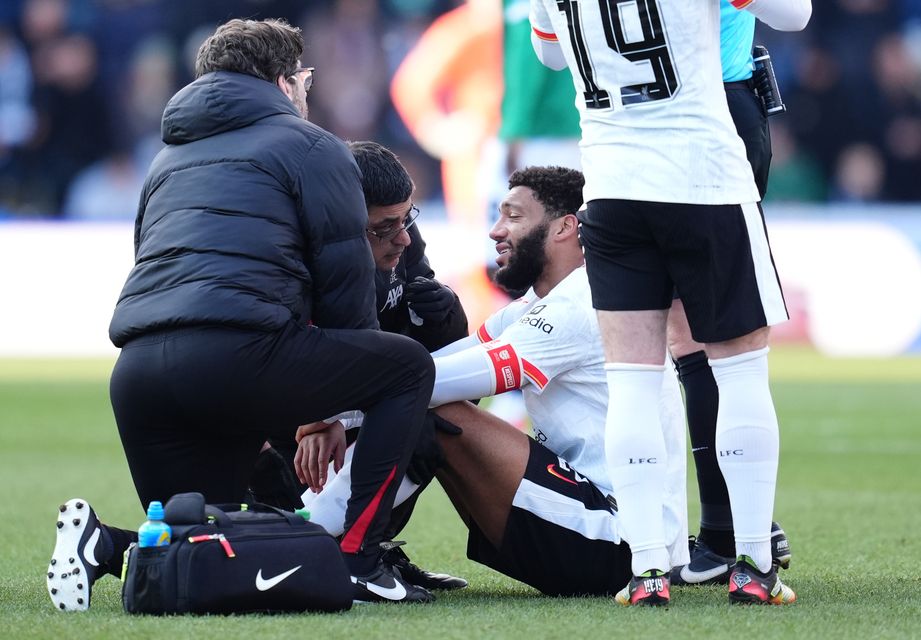 Liverpool defender Joe Gomez (sitting) suffered another injury straight after returning from a six-week lay-off (Adam Davy/PA)