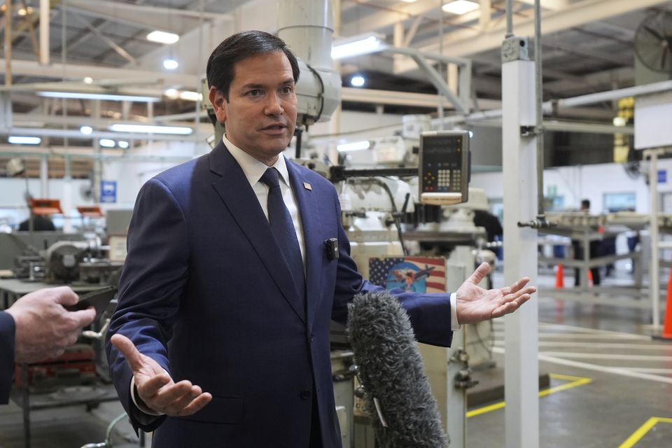 US Secretary of State Marco Rubio speaks to journalists during a visit to aircraft maintenance firm Aeroman in San Luis Talpa, El Salvador (Mark Schiefelbein/AP)