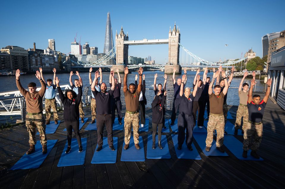 The mindfulness session at St Katharine Docks Marina marked the launch of the Royal British Legion Poppy Appeal 2024 (James Manning/PA)