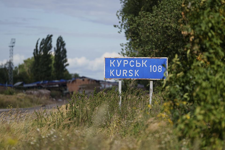 A road sign says Kursk 108 km on the Russian-Ukrainian border (Evgeniy Maloletka/AP)