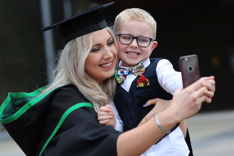 Joanne Mercer Celebrates her Degree in Adult Nursing with a selfie with son Hudson (5) at the Ulster University Winter Graduations at the Universitys Coleraine campus. Picture John Murphy Aurora PA