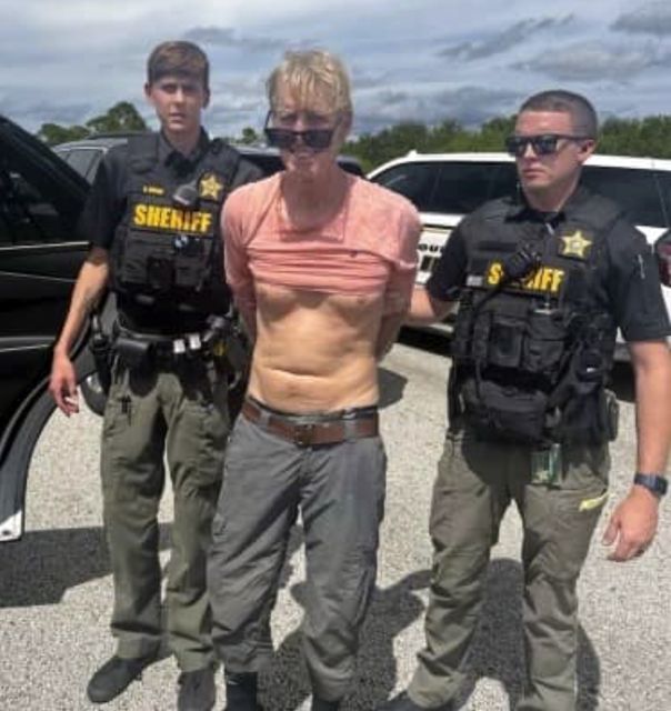 Police officers arrest Ryan Routh, the man suspected in the apparent assassination attempt of Donald Trump (Martin County Sheriff’s Office via AP)