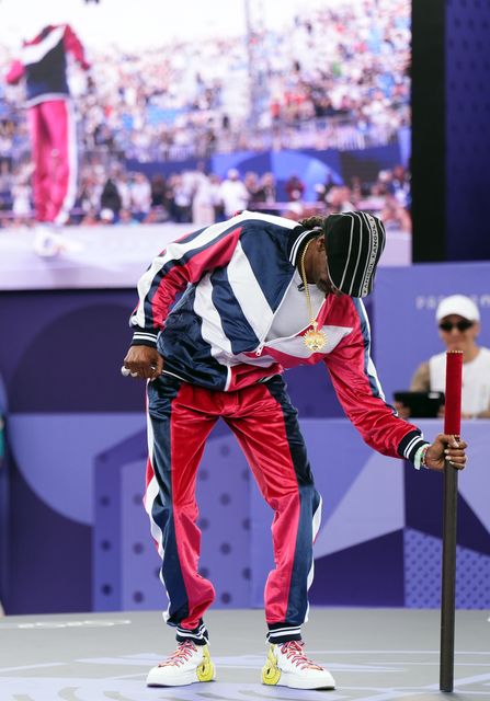 Snoop Dogg with the brigadier, used in the theatre to mark the opening of a performance, ahead of the Breaking at La Concorde (John Walton/PA)