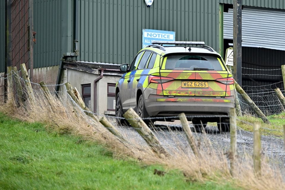 Police pictured at the scene of an overnight fire in Poyntzpass