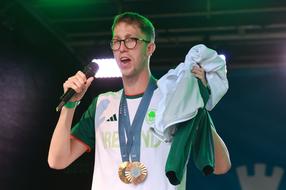 Swimming champion Daniel Wiffen addresses the crowd on O’Connell Street (Liam McBurney/PA)