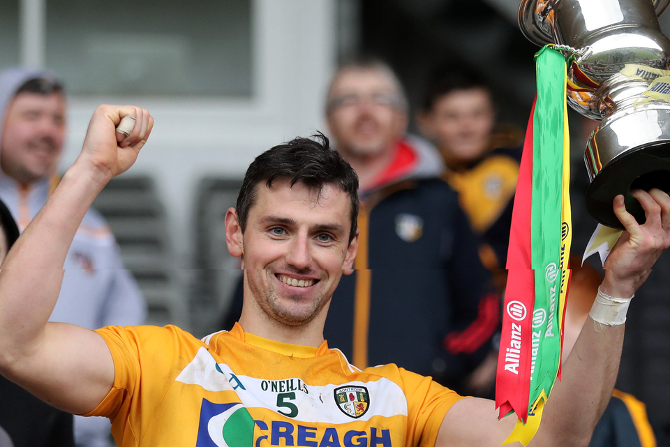 Glory day: Antrim's Simon McCrory lifts the Allianz Hurling Division 2A trophy