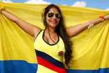 thumbnail: BELO HORIZONTE, BRAZIL - JUNE 14:  A Colombia fan holds a flag prior to the 2014 FIFA World Cup Brazil Group C match between Colombia and Greece at Estadio Mineirao on June 14, 2014 in Belo Horizonte, Brazil.  (Photo by Ian Walton/Getty Images)