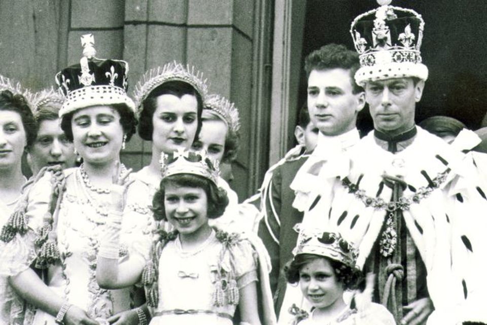 King George V1 (VI) : Coronation on May 12th 1937. The Royal family robed and crowned on the balacony of Buckingham Palace after the coronation, with the princesses.