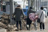 thumbnail: SENDAI, JAPAN - MARCH 14:  Local residents walk through an area damaged by a tsunami after a 9.0 magnitude strong earthquake struck on March 11 off the coast of north-eastern Japan, on March 14, 2011 in Sendai, Japan. The quake struck offshore at 2:46pm local time, triggering a tsunami wave of up to 10 metres which engulfed large parts of north-eastern Japan. The death toll is currently unknown, with fears that the current hundreds dead may well run into thousands.  (Photo by Kiyoshi Ota/Getty Images)